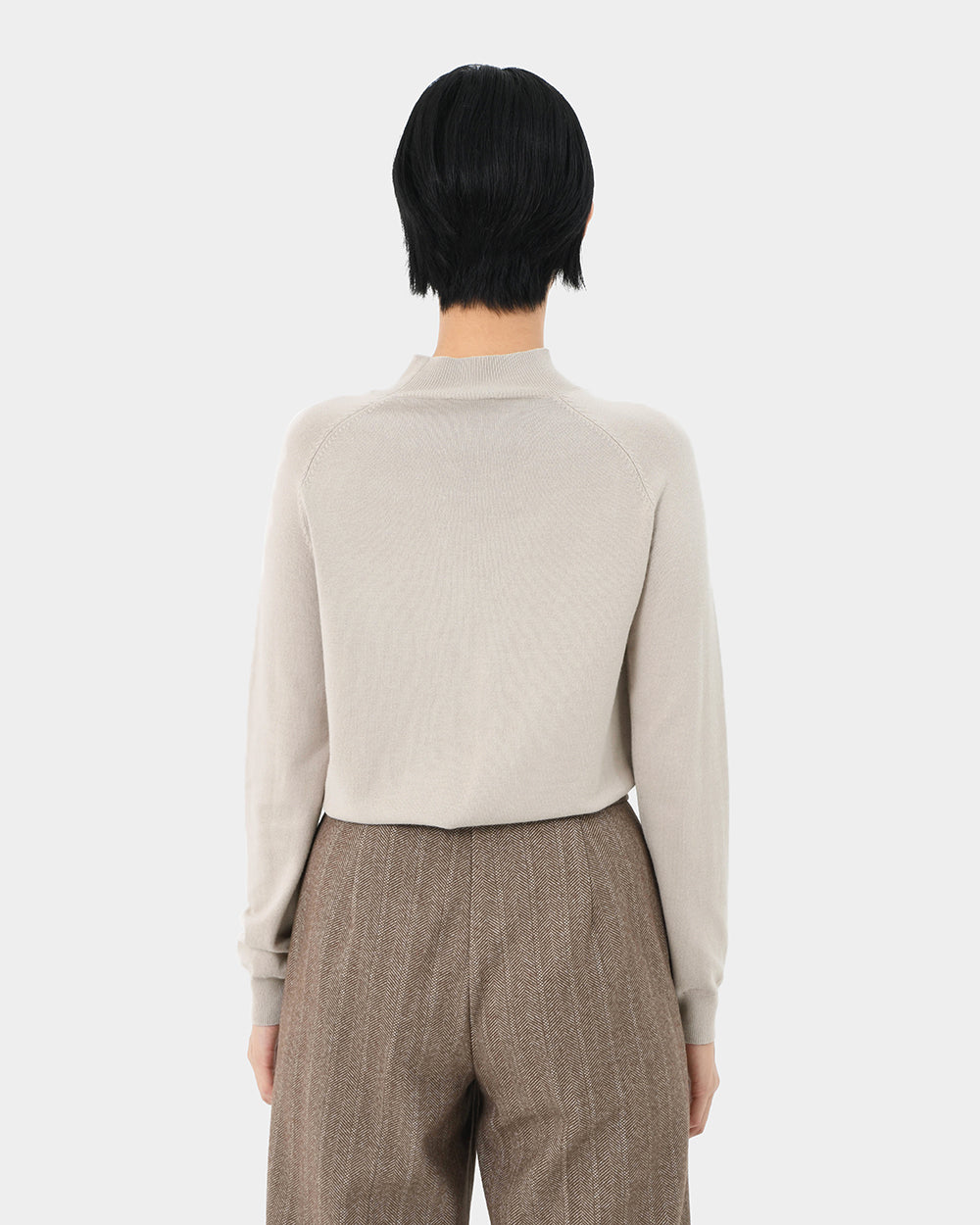 Maneh Mock Neck Knit in oatmeal — back view