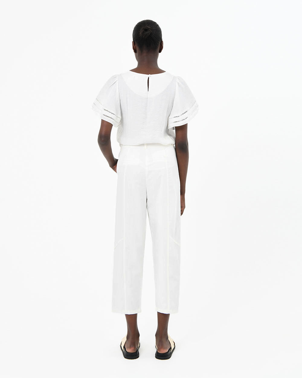 Jeanette Tapered Trousers in ivory — back view