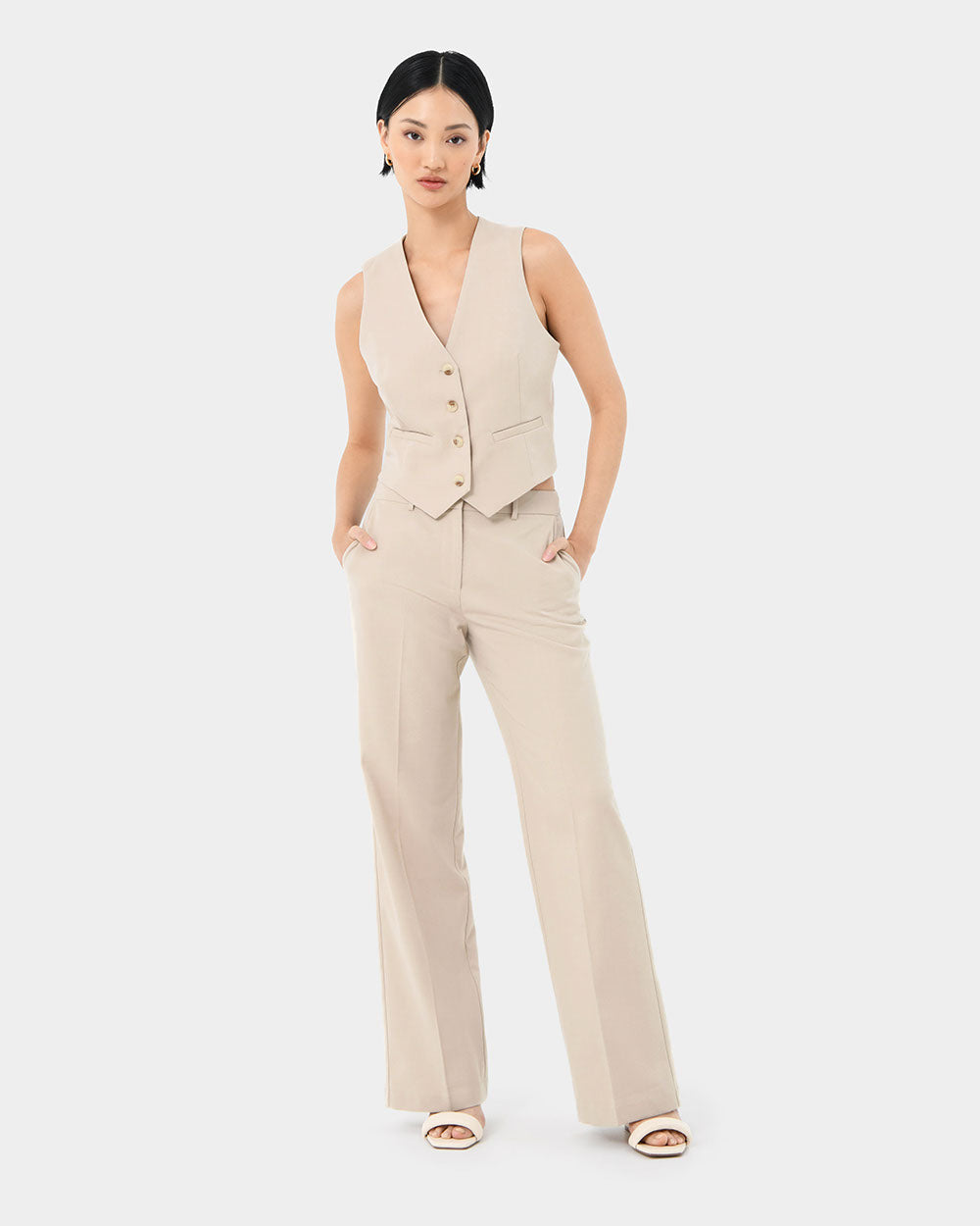 Mariel Wide Trousers in sand beige — full-length view
