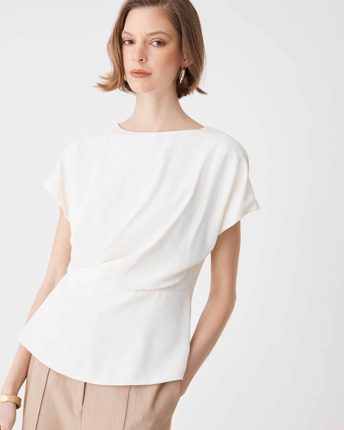 Bonnie Gathered Peplum Top in ivory — fabric detail