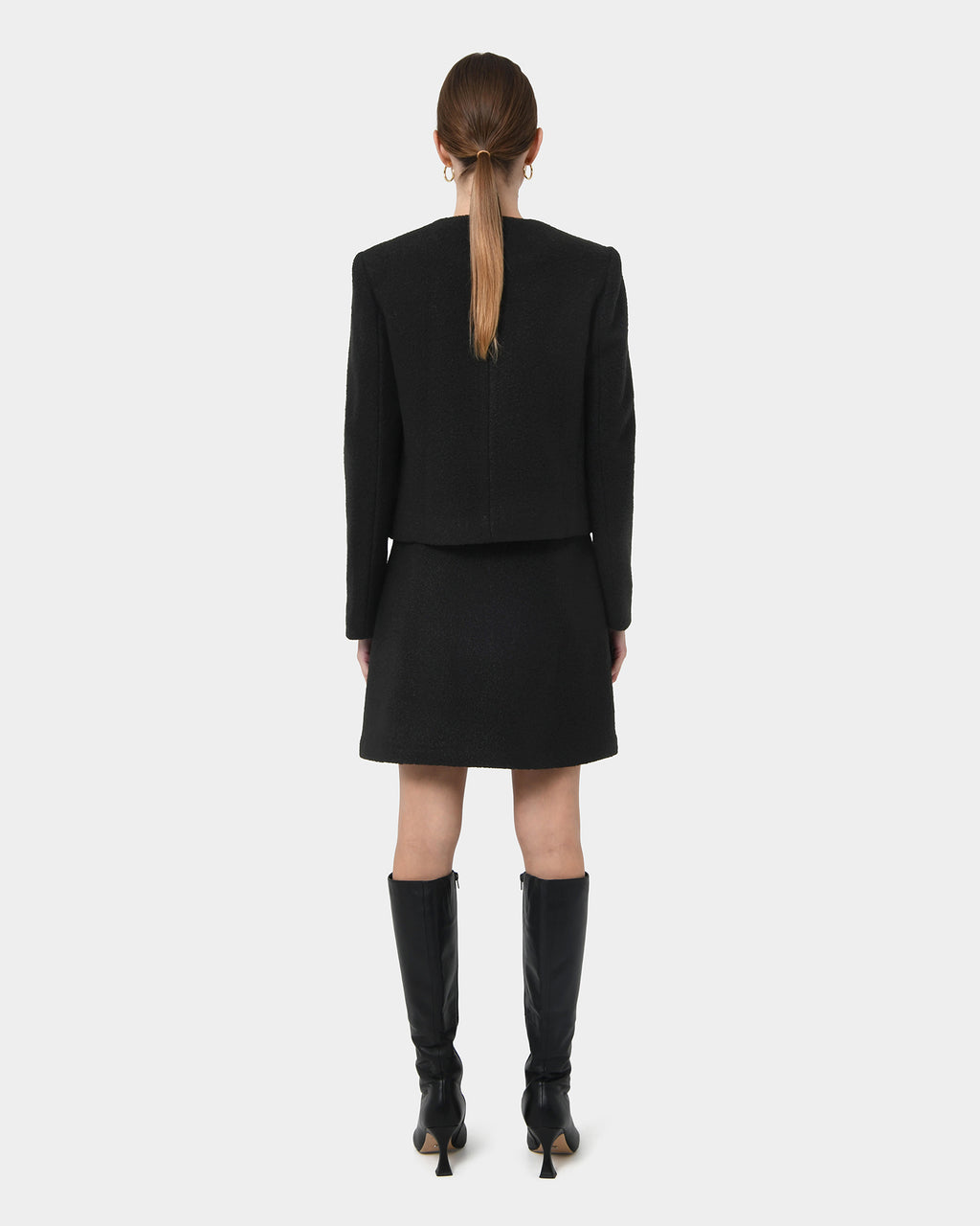 Zahra Boucle Yarn Mini Skirt in black — back view