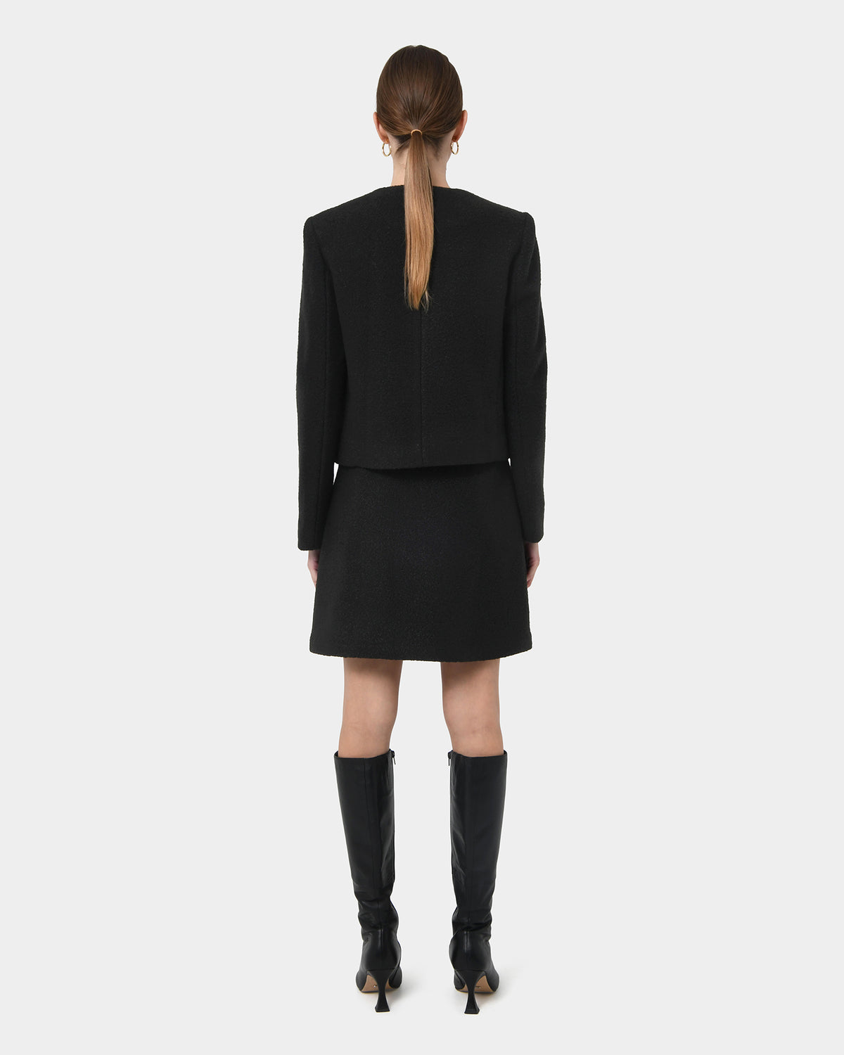 Zahra Boucle Yarn Mini Skirt in black — back view