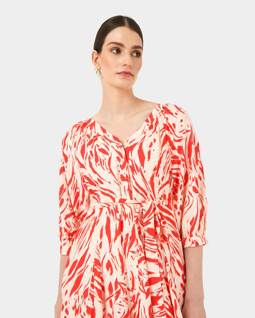 Vienna V-Neck Tie Dress in animal red — fabric detail