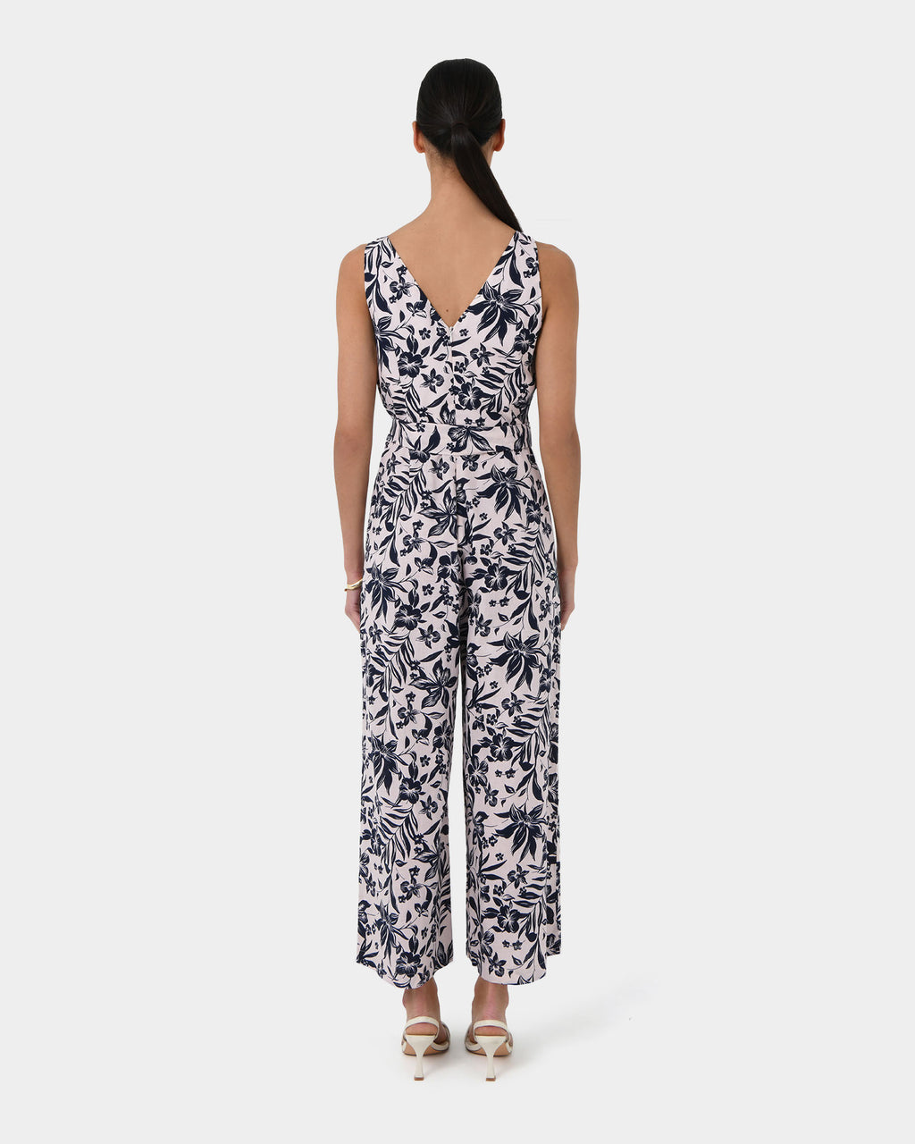 Ren Linen Blend Jumpsuit in navy floral — back view
