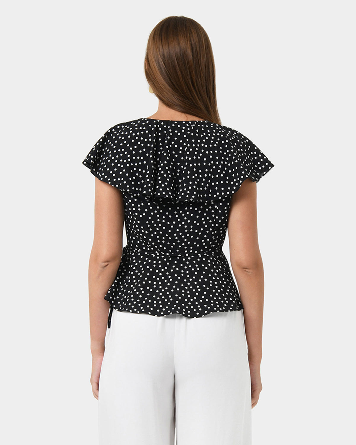 Jules Ruffle Wrap Blouse in polka dot — back view