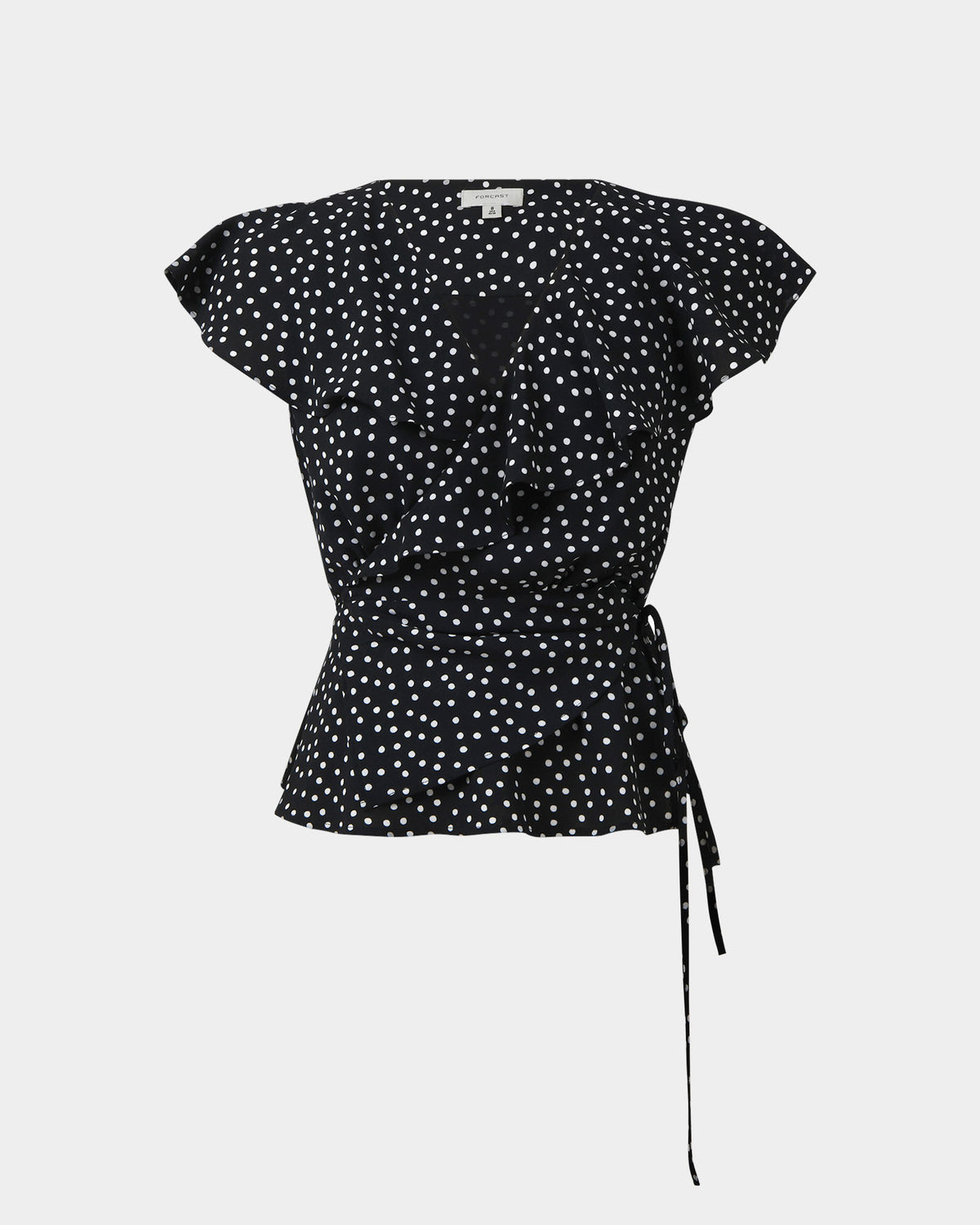 Jules Ruffle Wrap Blouse in polka dot — product-only view