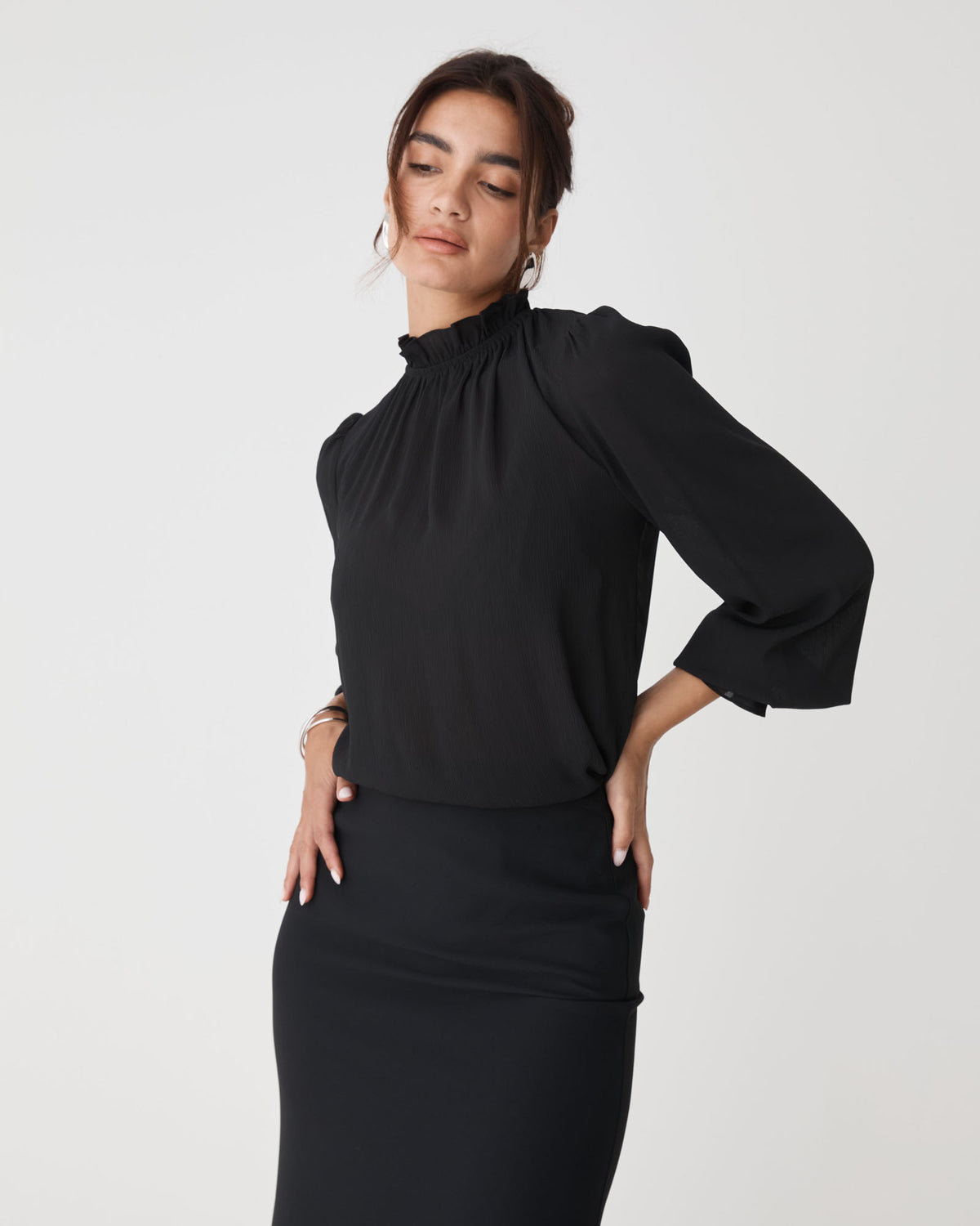 Hailey Frill Neck Blouse in black — close-up view