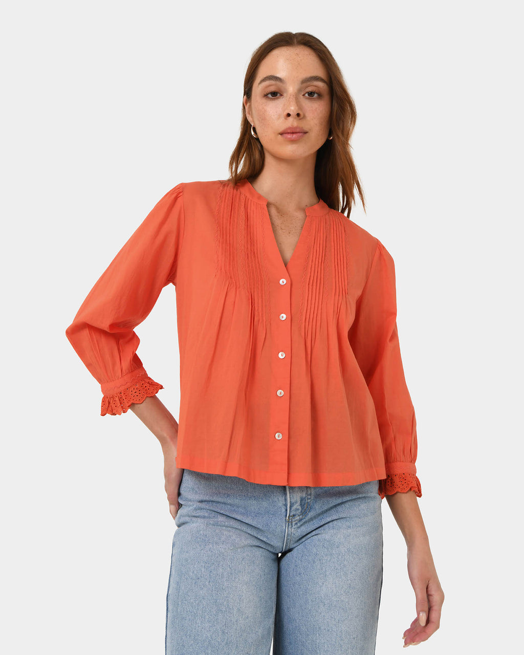 Akira Vneck Embroidery Blouse in cherry tomato — close-up view
