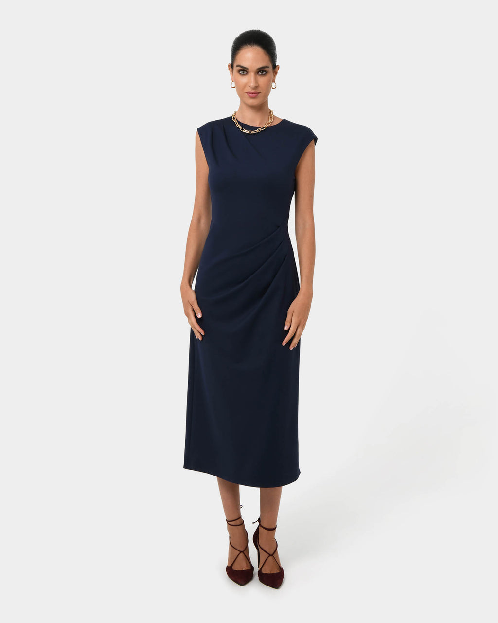 Adele Pleated Midi Dress in navy — full-length view