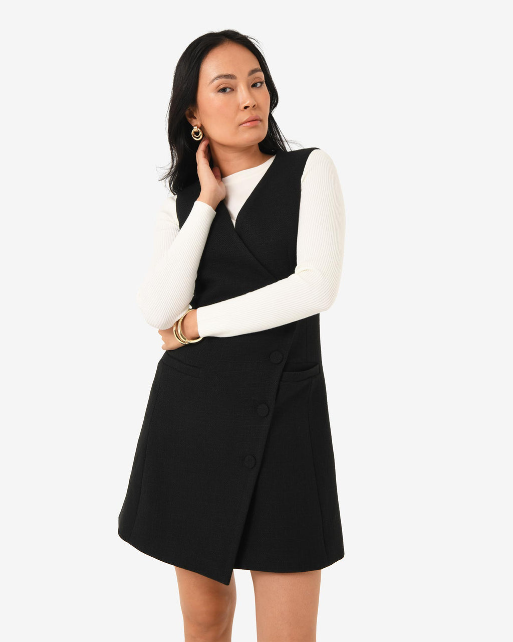 Beth Asymmetric Mini Dress in black — close-up view