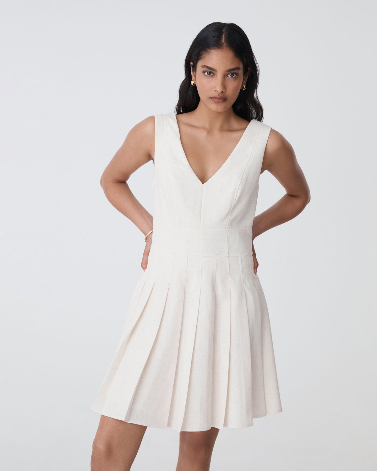 Mikala Pleated Mini Dress in rice marle — close-up view