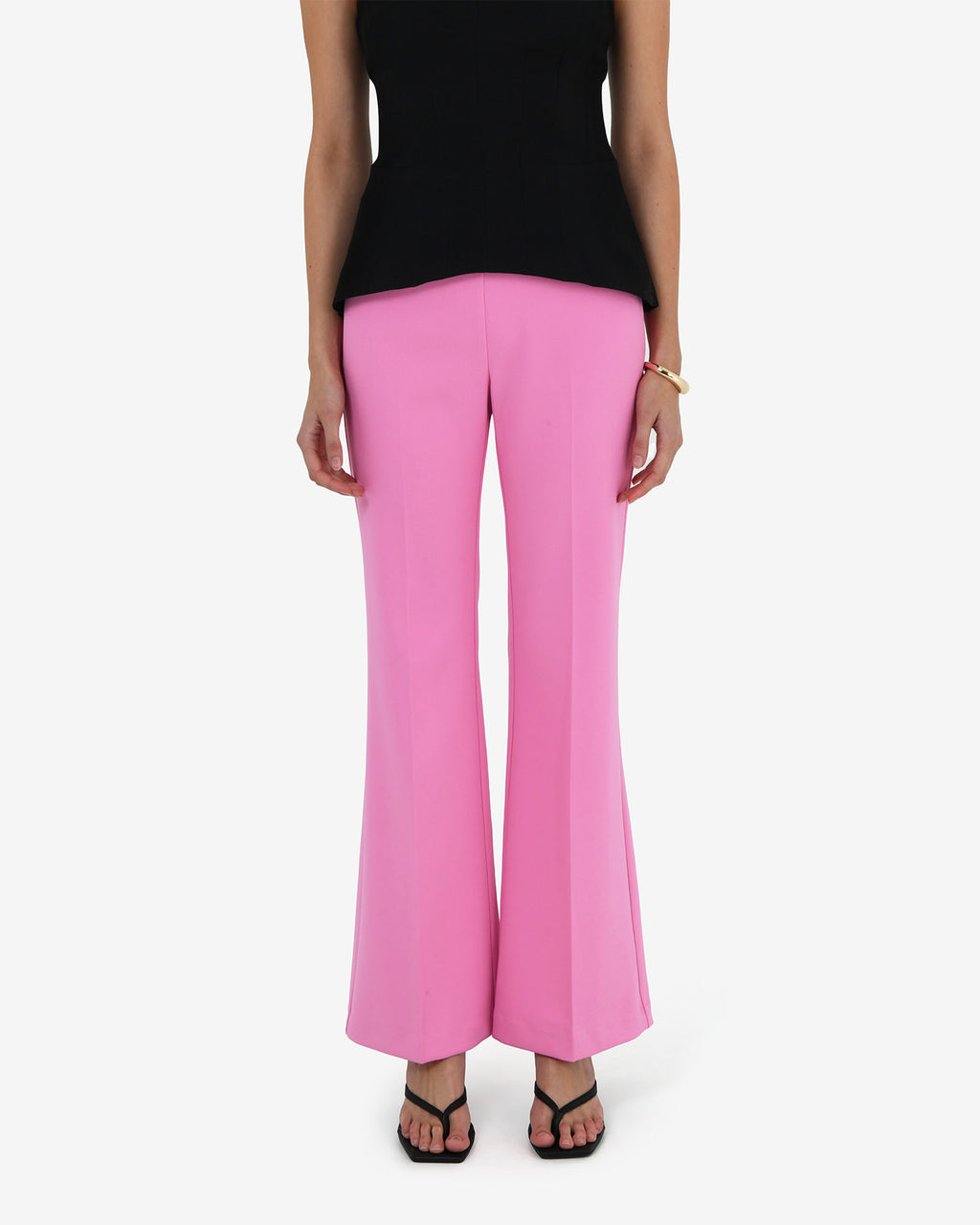 Belmore Crepe Flared Pants in bubblegum — close-up view