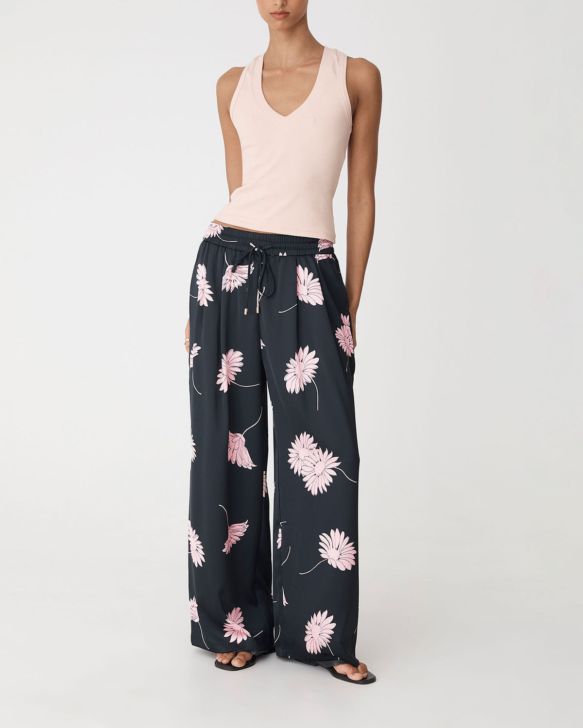 Felicia Satin Elastic pants in black pink — close-up view