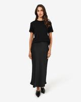 Valeria A-line Satin Skirt in black — full-length view