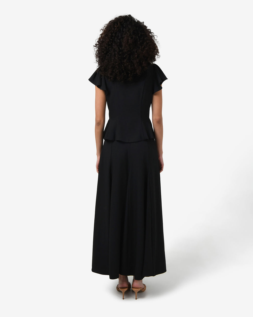 Carissa Godet Skirt in black — back view