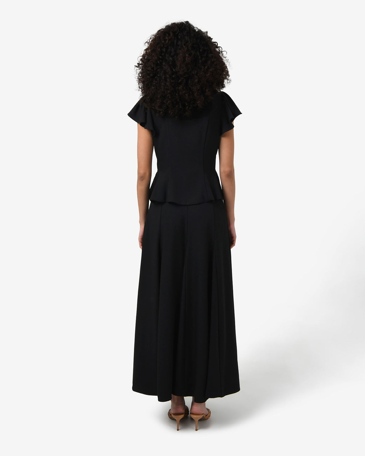 Carissa Godet Skirt in black — back view