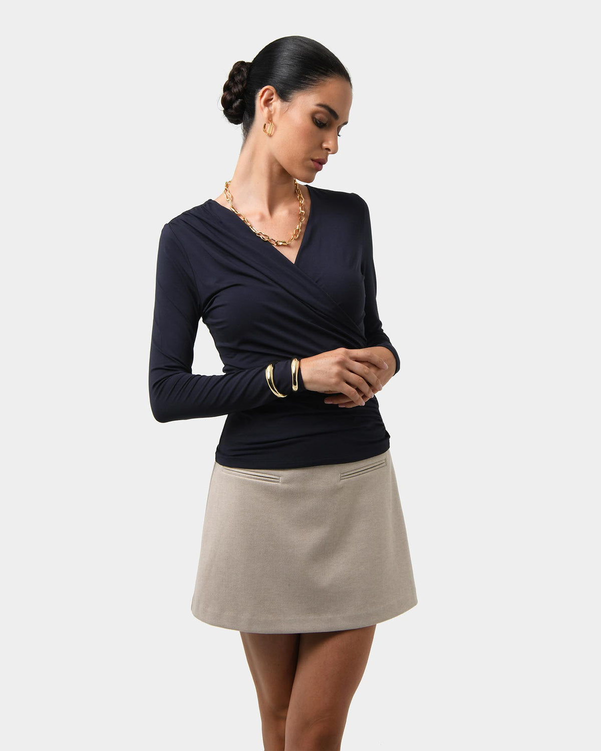 Tika Crossover Ruched Top in midnight — close-up view