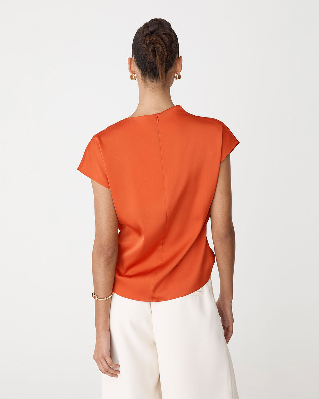 Zafina Pleated Draped Top in burnt orange — back view