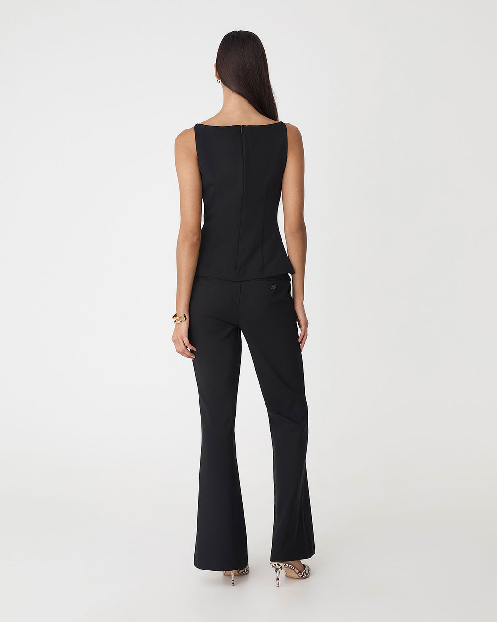 Hannah Apron Top in black — back view