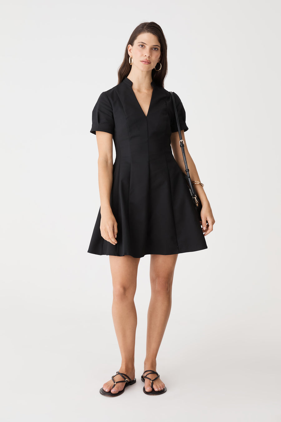 Stacey Panelled Mini Dress in black, full-length front view with short sleeves and flared skirt