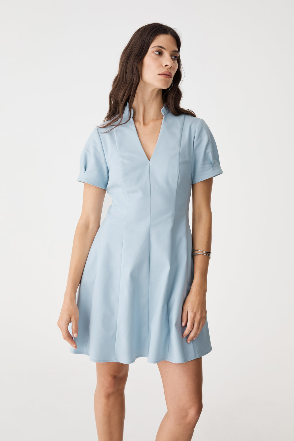 Front view showing Nehru collar and open V-neckline of the powder blue mini dress