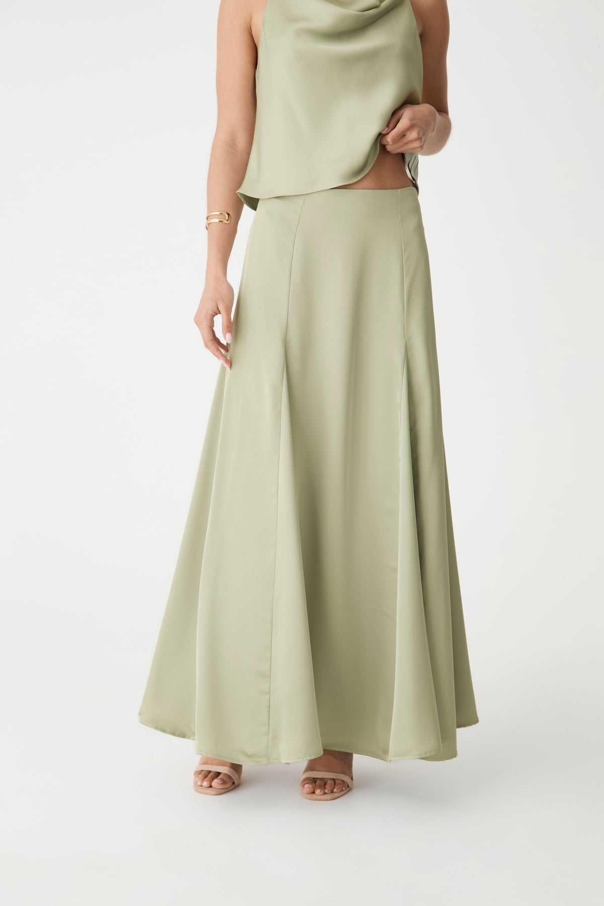 Freya Satin Godet Skirt in pistachio — close-up view