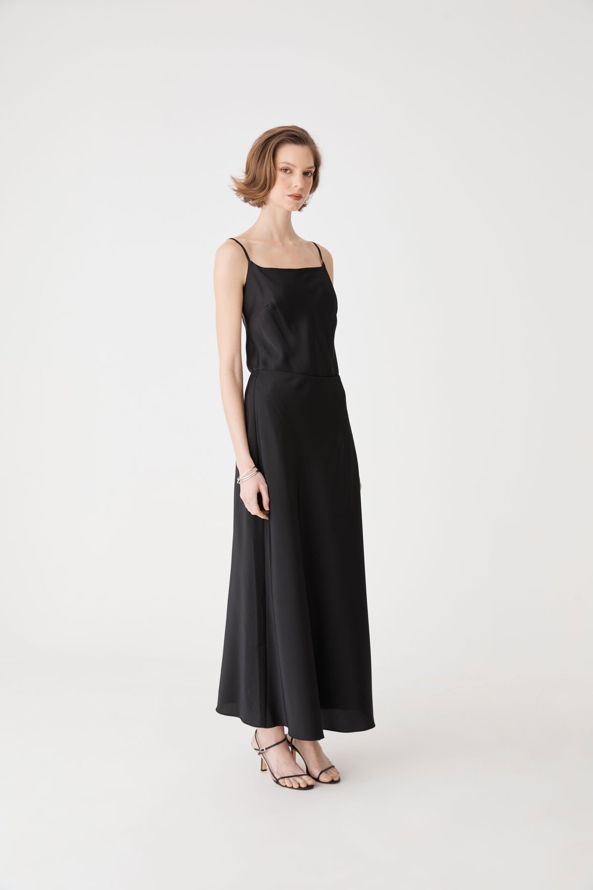 Louise Bias Satin Skirt in black — side view