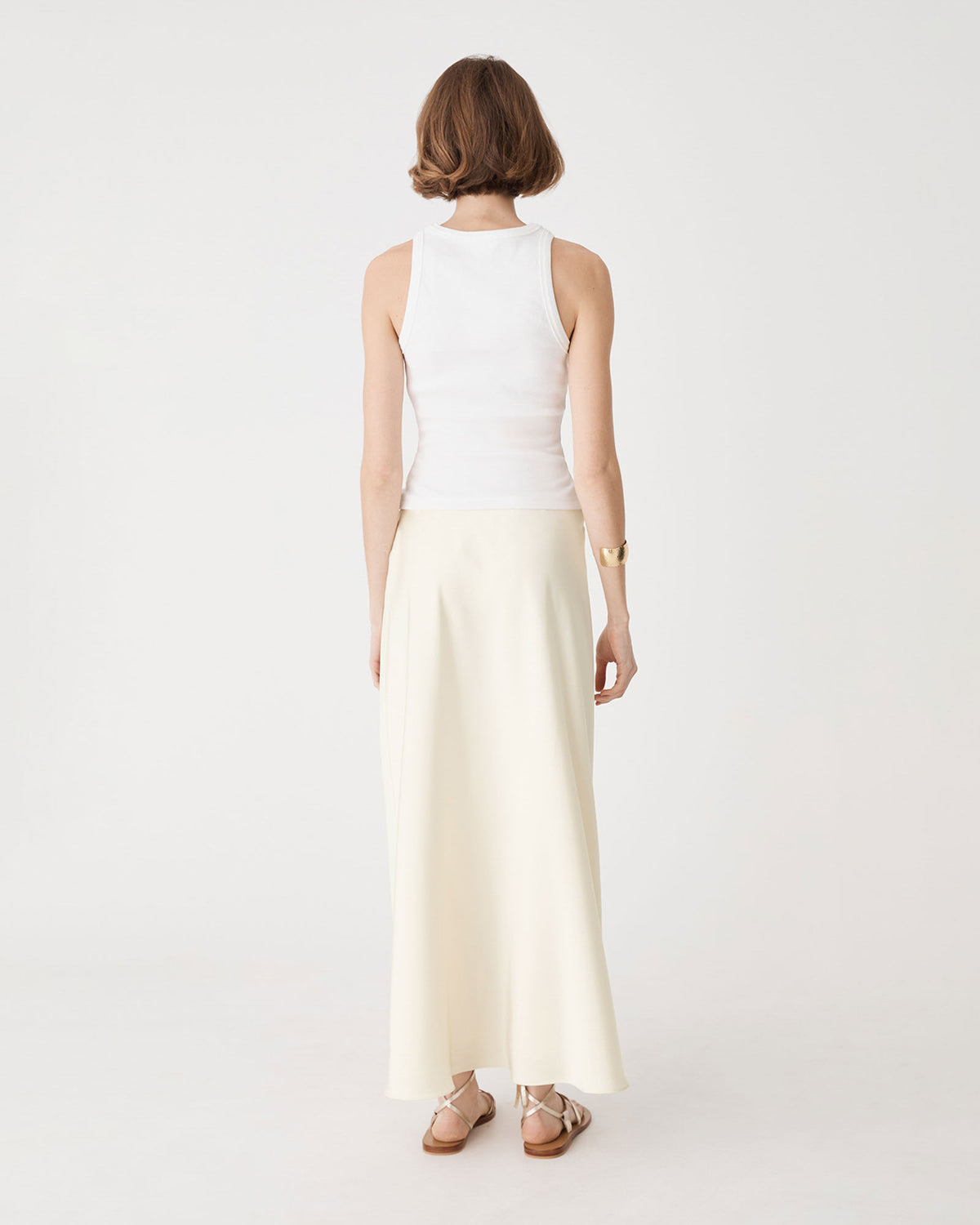 Louise Bias Satin Skirt in vanilla — back view