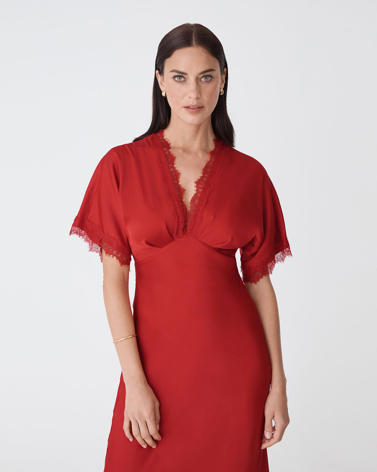Cleo Lace Trim Satin Dress in scarlet — close-up view