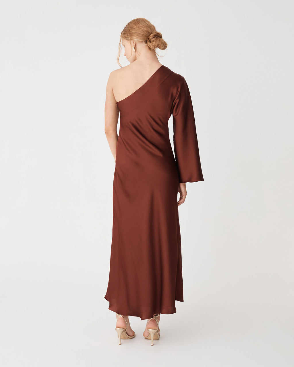 Cleo One Shoulder Satin Dress in brick — back view