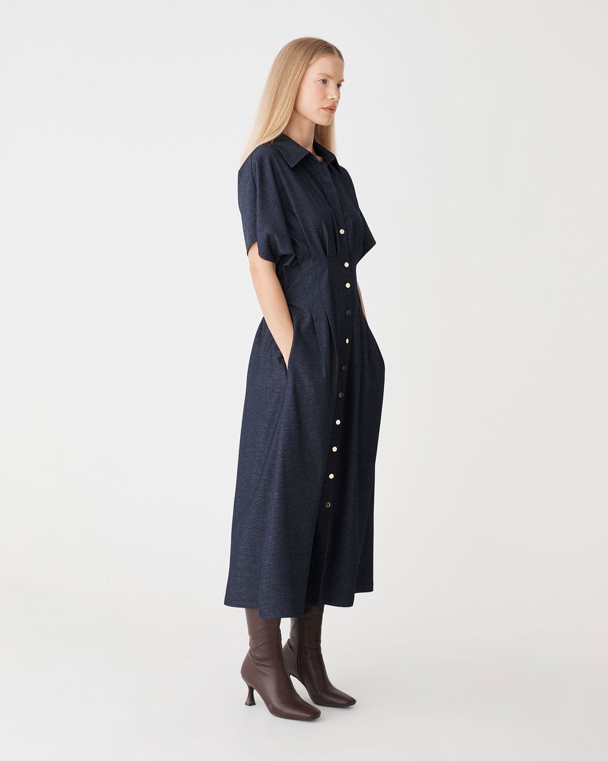 Gilda Pleat Waist Dress in indigo — side view