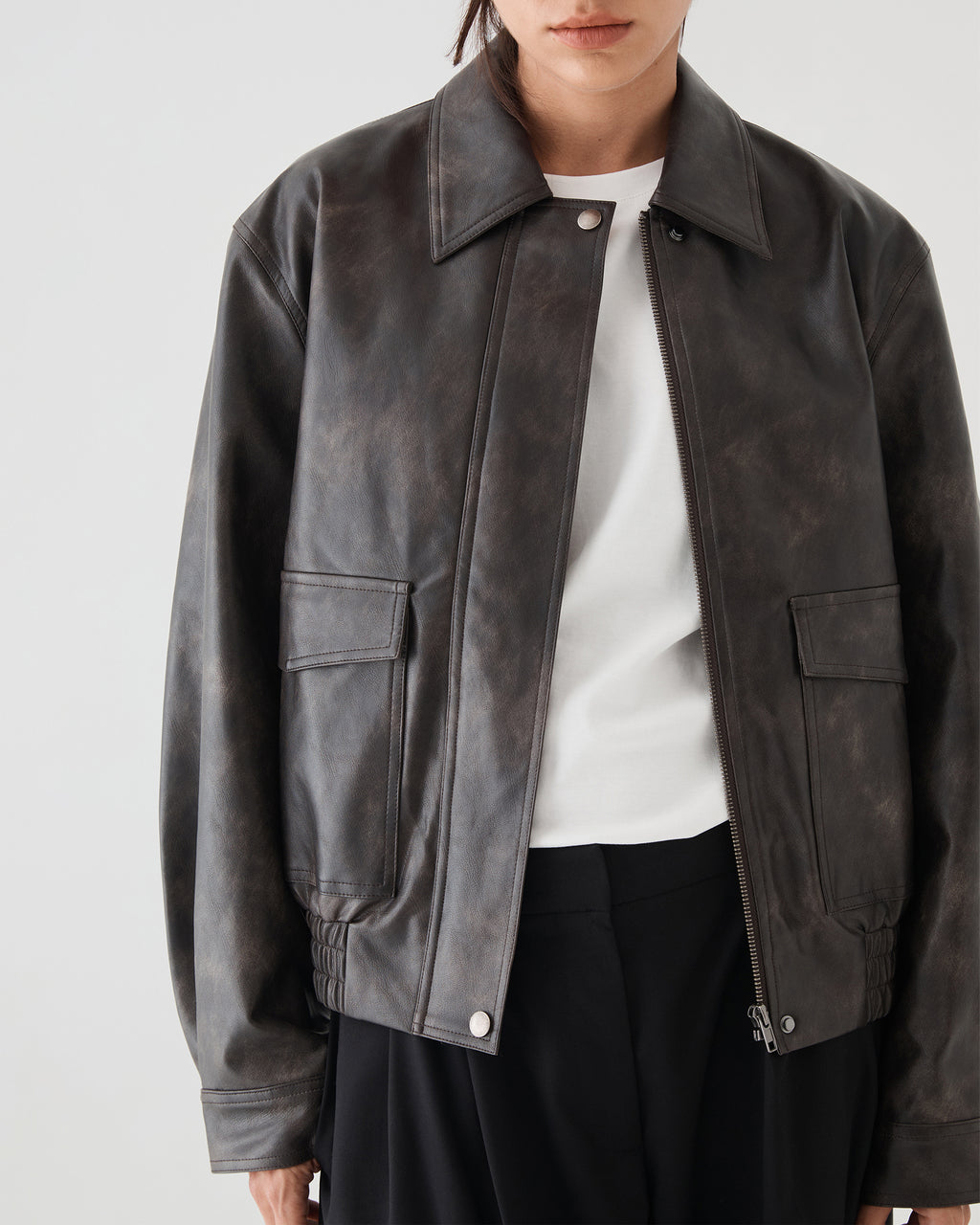 Ada Faux Leather Bomber Jacket in dark brown — close-up view 2