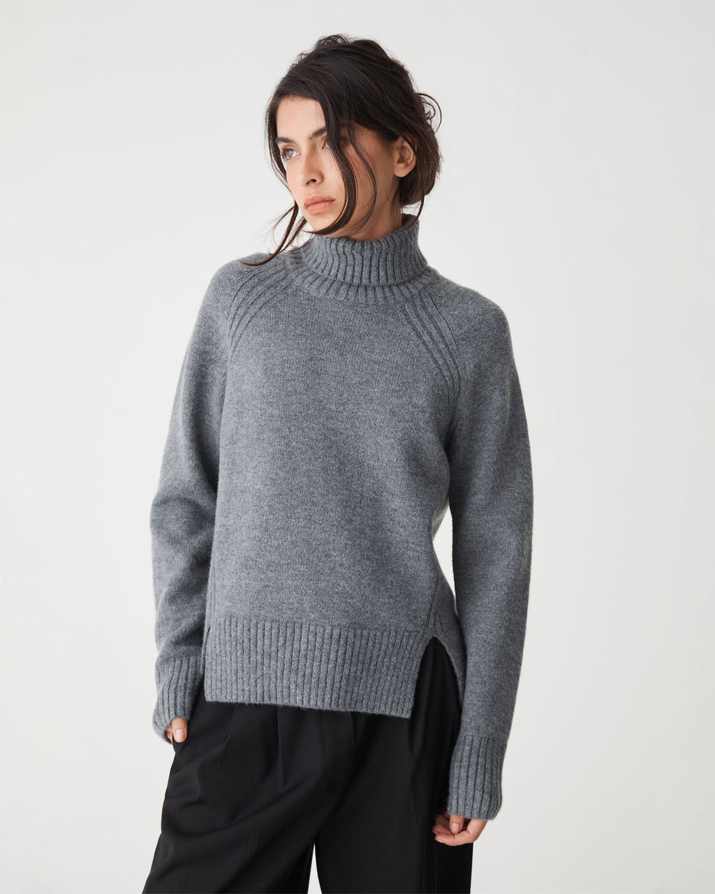 Jada Notch Hem Turtleneck Knit in grey marle — close-up view