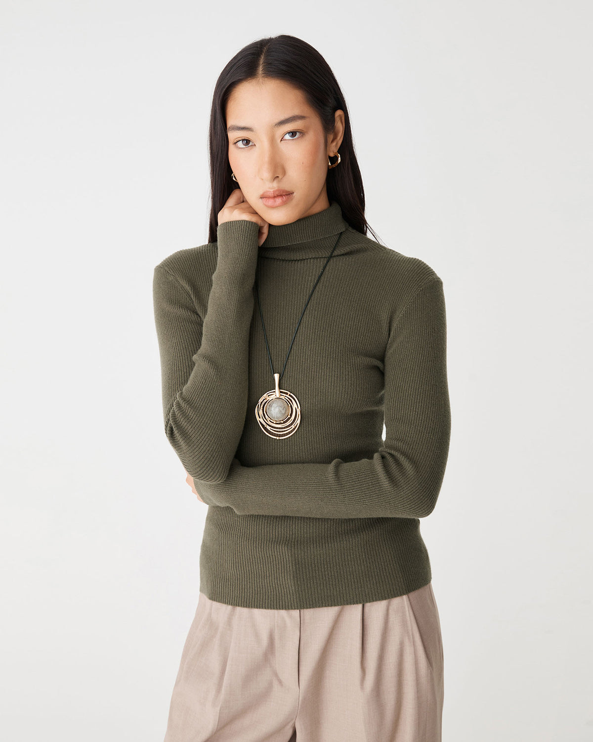 Ginny Ribbed Turtleneck Knit in olive — close-up view