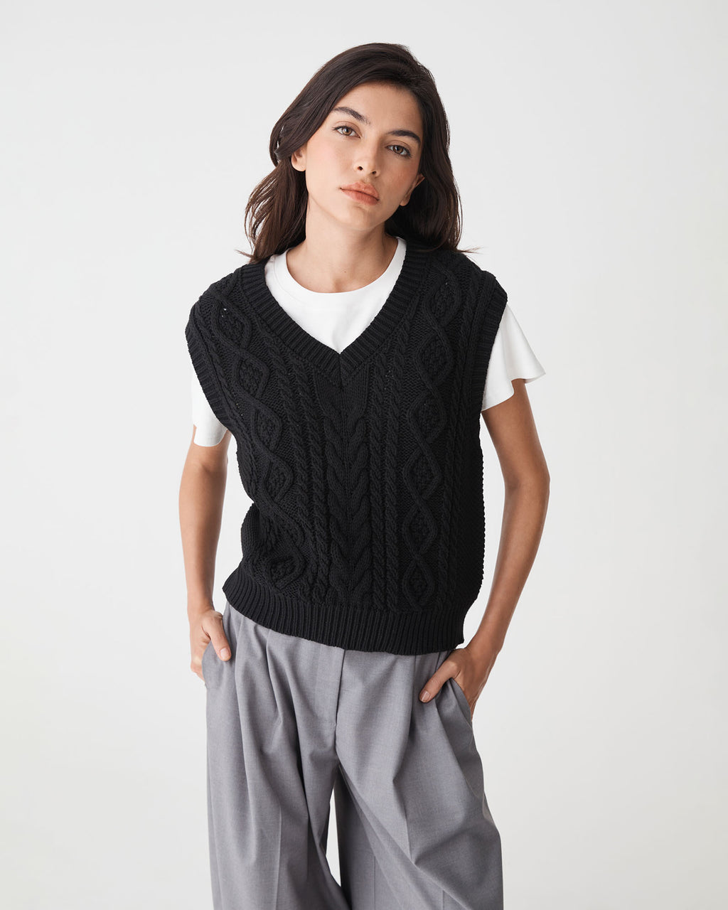 Poppy Sleeveless Cable Knit in black — close-up view