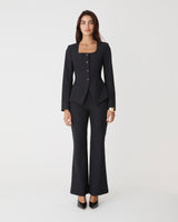 Thea Bootleg Pants in black — full-length view