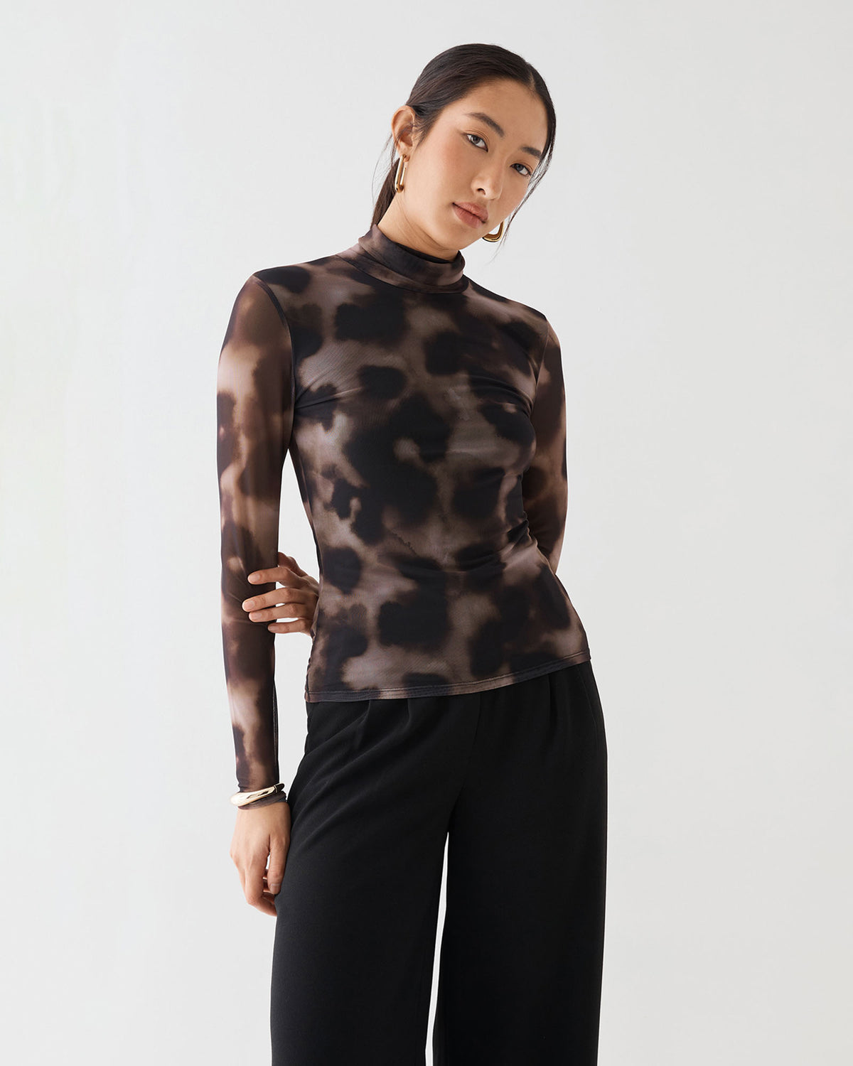 Savanna Printed Mesh Top in brown abstract — close-up view