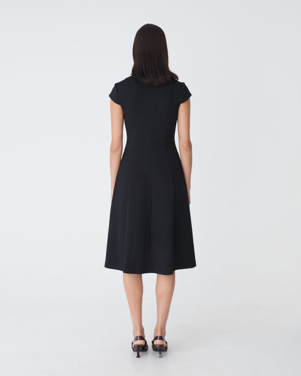 Juno Panel Ponte Dress in black — back view